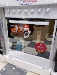 Cuisinière géant punto blanc 4 feux ventilé 