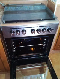 Cuisiniere 4f ventité autonetoiyon alumage intégré tourne brochr