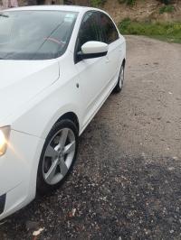 سيارات-skoda-rapid-2013-آث-منصور-تاوريرت-البويرة-الجزائر