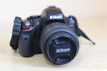  nikon d5100 avec objdectif af s nikkor 18 55 mm 3.5 5.6 g prix 50000 negociable