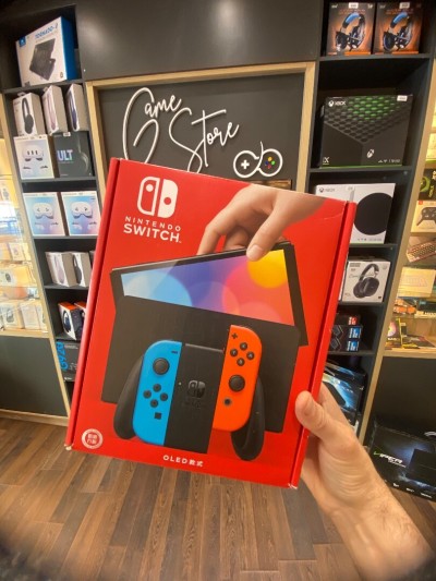 Nintindo switch oled flache plus jeux