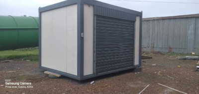 Kiosque commercial neuf avec rideau galvanisé électrique