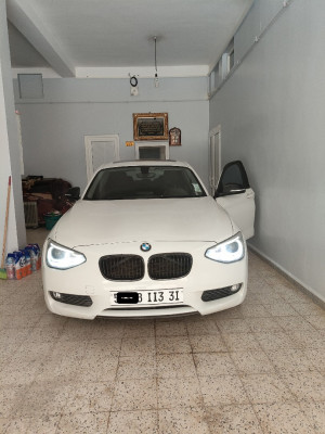 average-sedan-bmw-serie-1-2013-f20-116i-oran-algeria