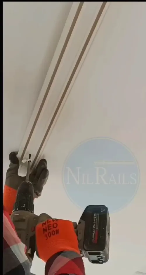 Tringle rail rideau 