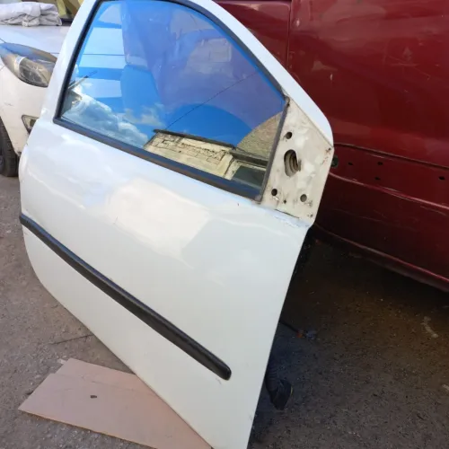 Porte à droite twingo 2013 fina sbigha blache