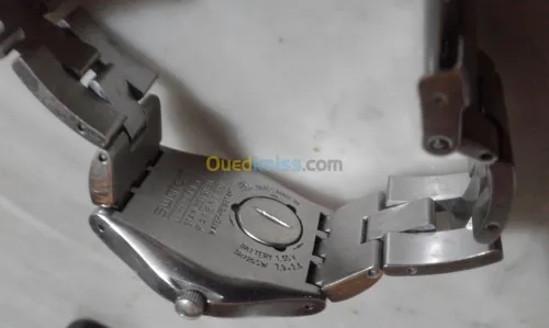SWATCH femme original + pendentif (rssassa)