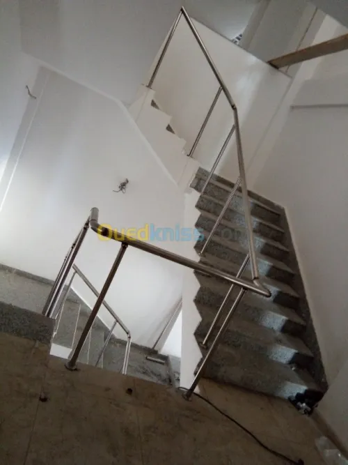 Travaux en inox et verre