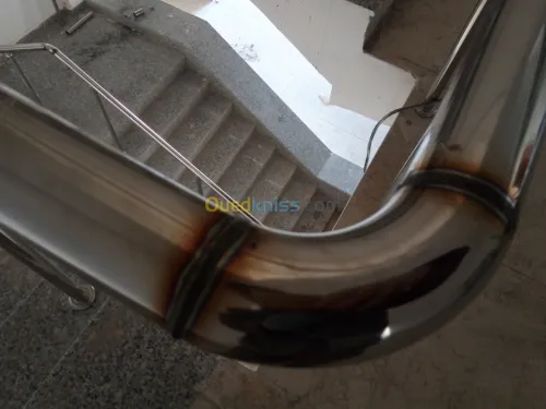 Travaux en inox et verre