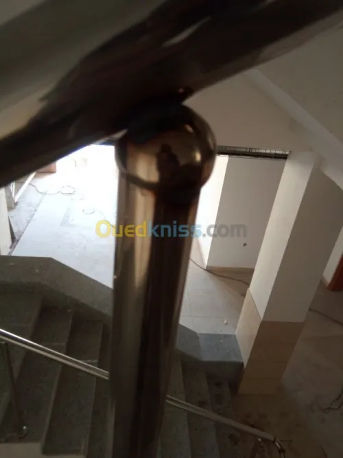 Travaux en inox et verre