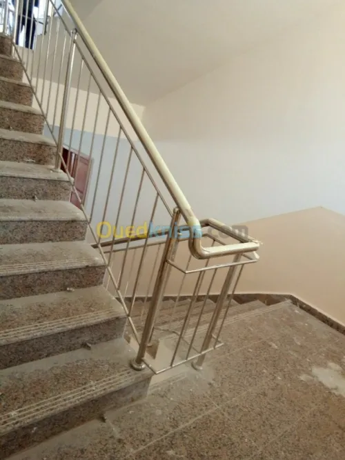 Travaux en inox et verre