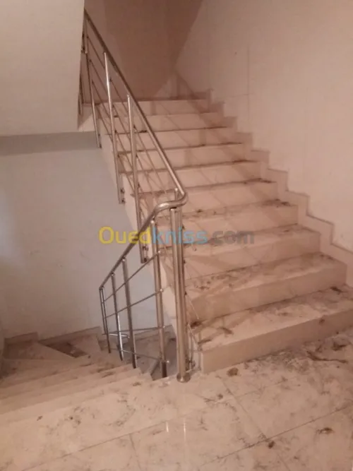 Travaux en inox et verre