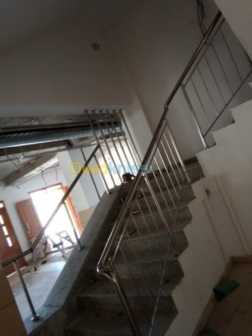 Travaux en inox et verre