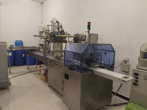 Ligne de conditionnement de lingettes humides