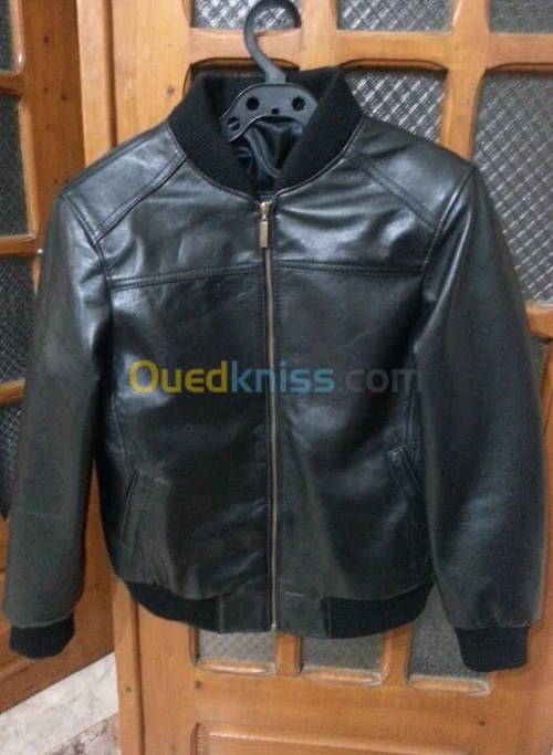 réparations+retouche+tenture CUIR 