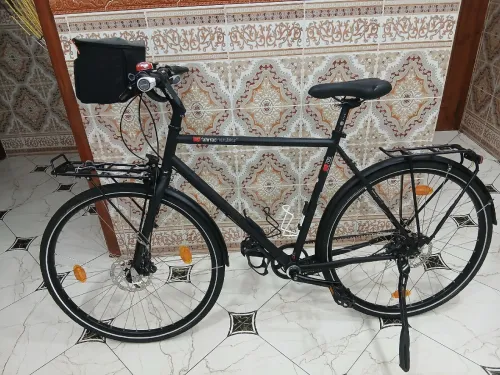 دراجة سفر المانيةVélo trekking VSF Fahrradmanufaktur T-700 - Alfine    + اكسيسوار accessoires vélo  كامل التجهيزات  صاكوش قيدون  صاكوش اريار 25 جدد  روض 28  لي بورت بقاج  الاغواط  0663947616