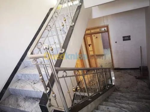 Rampes d'escaliers en inox et verre