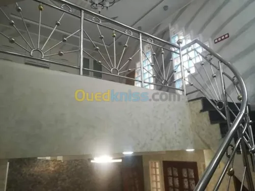 Rampes d'escaliers en inox et verre