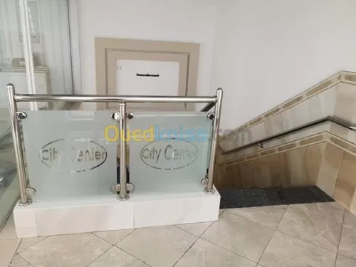 Rampes d'escaliers en inox et verre