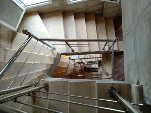 Rampes d'escaliers en inox et verre