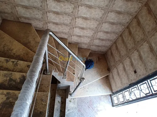 Rampes d'escaliers en inox et verre