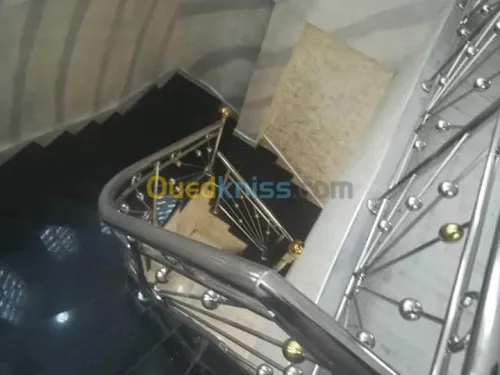 Rampes d'escaliers en inox et verre