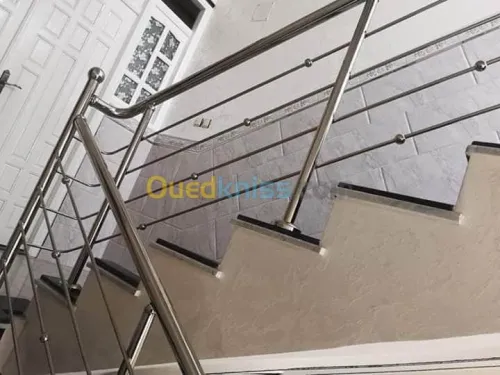 Rampes d'escaliers en inox et verre