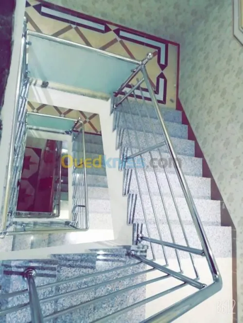 Rampes d'escaliers en inox et verre