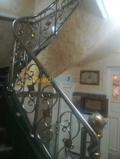 Rampes d'escaliers en inox et verre