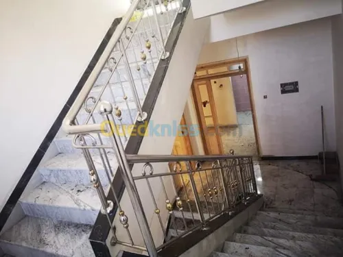 Rampes d'escaliers en inox et verre