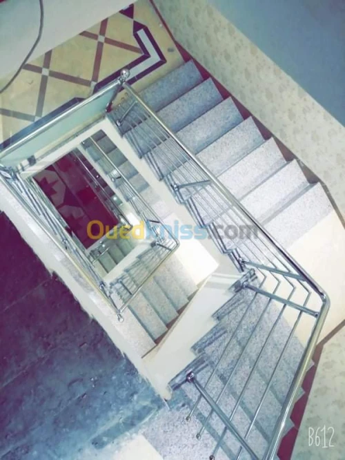 Rampes d'escaliers en inox et verre