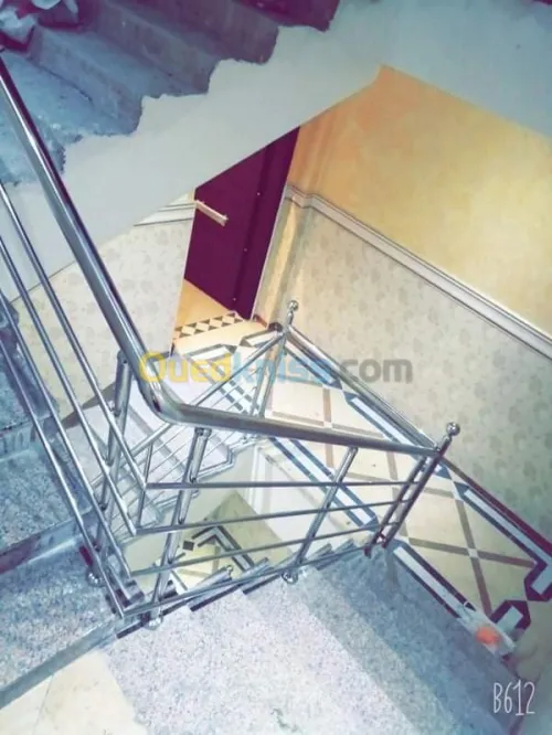 Rampes d'escaliers en inox et verre