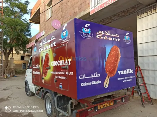 HABILLAGE VÉHICULE VITRINE ET PANNEAUX