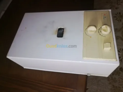 Réparation chauffe bain