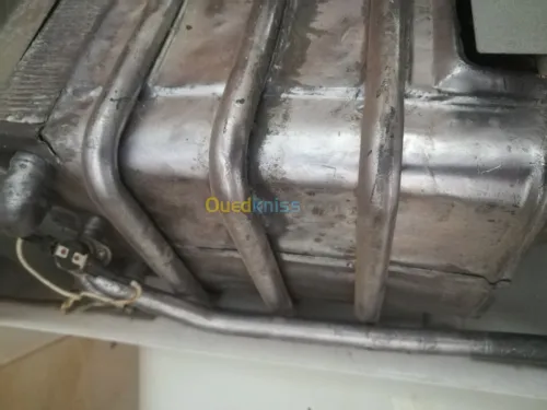 Réparation chauffe bain