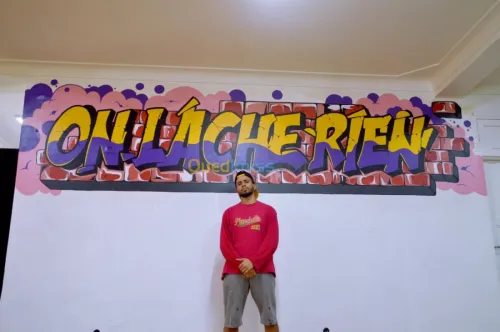 رسام على الجدران - Dessinateur sur mur