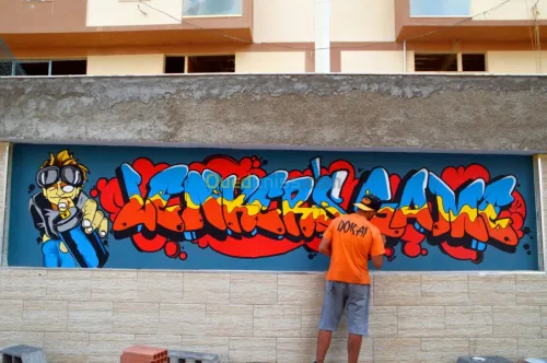 رسام على الجدران - Dessinateur sur mur