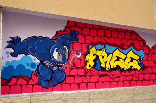 رسام على الجدران - Dessinateur sur mur