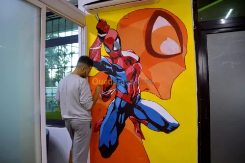 رسام على الجدران - Dessinateur sur mur