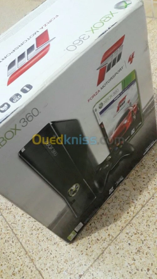 Xbox360 slim + bcp de jeux