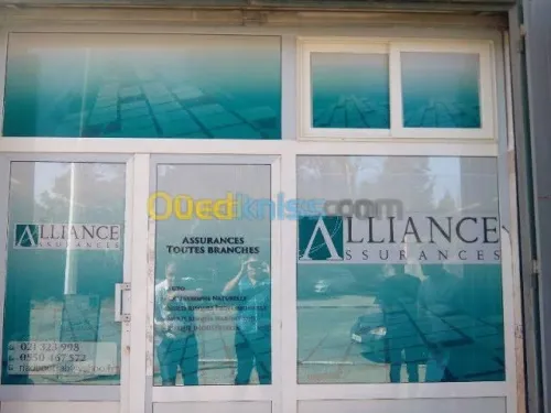 Habillage vitrine لافتات اشهارية
