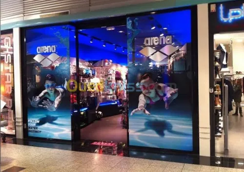Habillage vitrine لافتات اشهارية