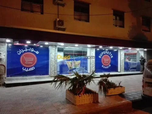 Habillage vitrine لافتات اشهارية