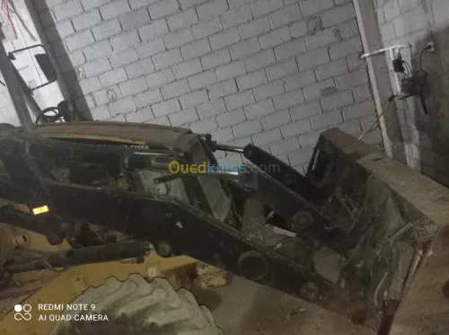 ريتروشارجور كاتر بيل 438c. 2001