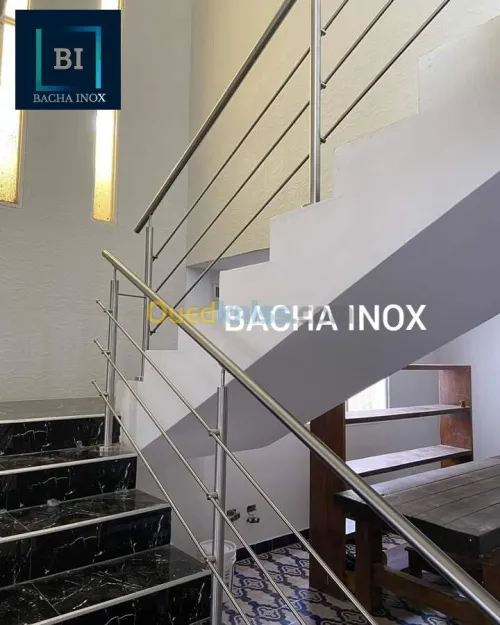 Rampe d'escalier en verre et en inox