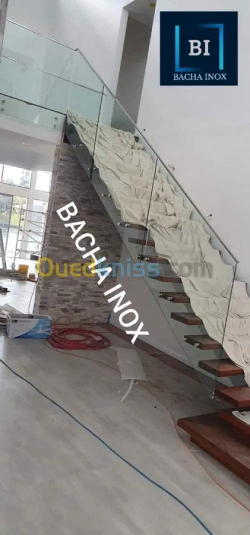 Rampe d'escalier en verre et en inox