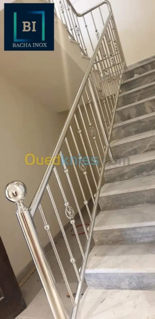 Rampe d'escalier en verre et en inox