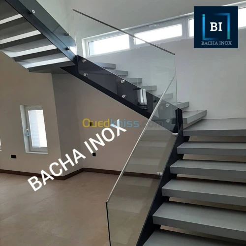 Rampe d'escalier en verre et en inox