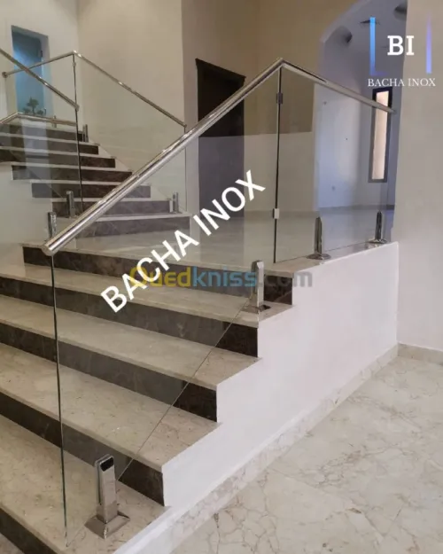 Rampe d'escalier en verre et en inox