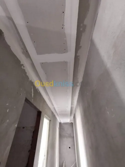 Plaque au plâtre et PVC