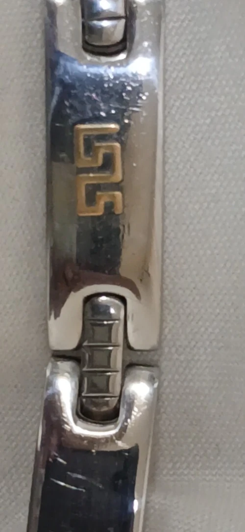 Brasler or et assier 750 itali serter avec or blanc malfuk